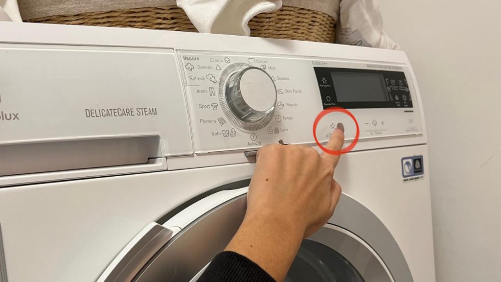 Asciugatrice, con questo tasto i panni si asciugano in 30 minuti: risparmi tempo